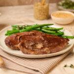 Chuletas de cordero en salsa de mostaza